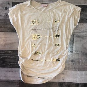 A light brown arrow shirt.